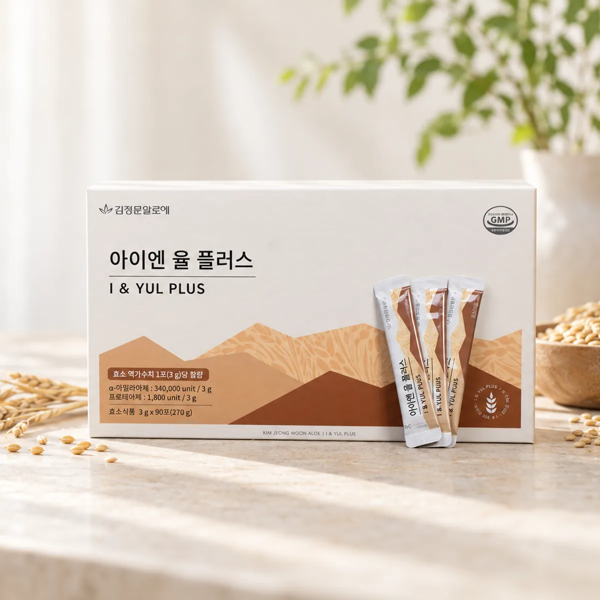 Hộp Enzyme I & Yul Plus cùng vài gói nhỏ và cốc nước trên bàn bếp